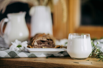 Milk and cookies on table with decoration 