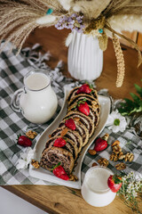 Milk and cookies on table with decoration 