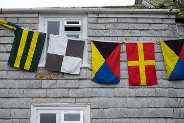 Padstow Cornwall UK 04 30 2023 May Day flags and pennants