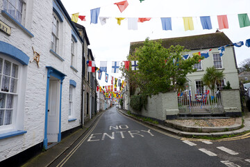 Fototapeta na wymiar Padstow Cornwall UK 04 30 2023 May Day flags and pennants