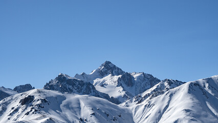 snowy mountain peaks. snow cliffs. the icy desert. snowy expanses