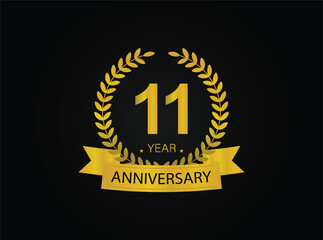 11th golden anniversary logo. with ring and ribbon.