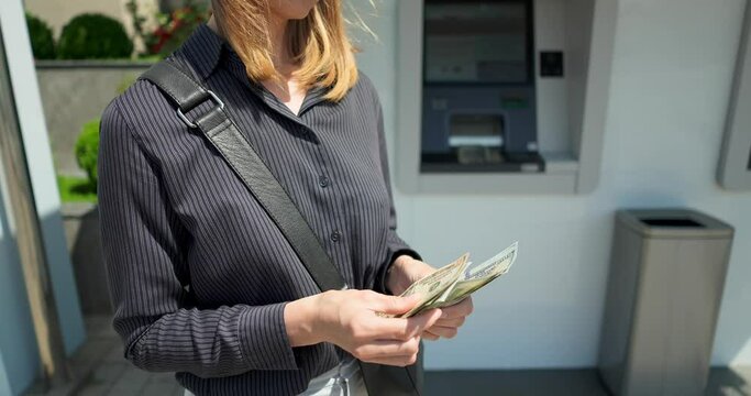 Business woman counting us dollars near ATM machine  Generative AI