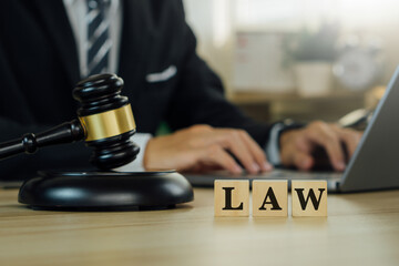 LAW word in wooden cube.Law legal technology concept.Legal advice online,Internet law.Law and justice concept.