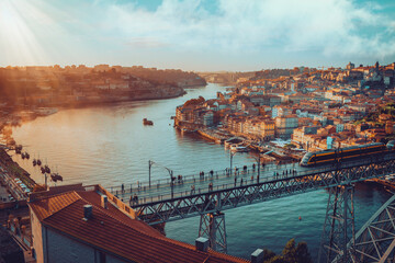 Porto, Portugal Dom Luis Iron Bridge featuring Douro River, Metro Train and Port Wine Boats  - obrazy, fototapety, plakaty