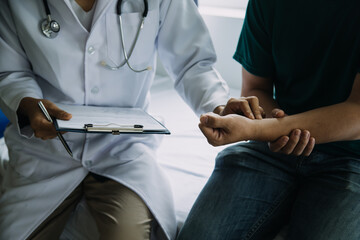 Doctor telling to patient woman the results of her medical tests. Doctor showing medical records to cancer patient in hospital ward. Senior doctor explaint the side effects of the intervention.