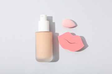 Concept of cosmetic and make up - foundation, top view