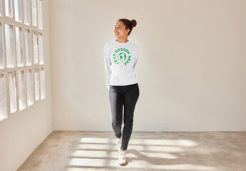 Mockup of customizable sweatshirt being modelled by woman, front view