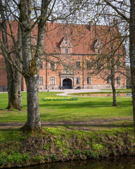 Naklejka premium Cannons in front of the entrance to the castle of Svenstorp in Skåne Sweden during early spring