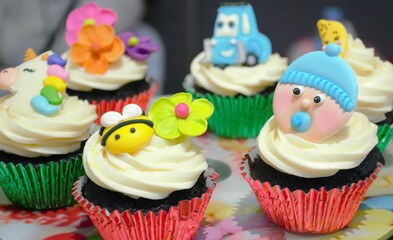 cupcakes with cream and toppers