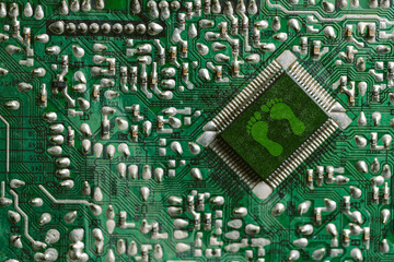 Environment green technology computer chip. Green world icon on circuit board technology...