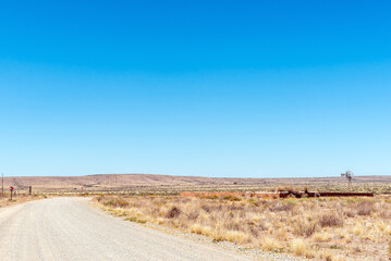 Stone livestock enclosure and windmill at Putsonderwater