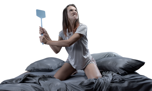 Angry woman killing mosquitoes with a fly swatter