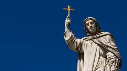 Fototapeta premium Girolamo (Jerome) Savonarola, an Italian Dominican friar from Ferrara and preacher active in Renaissance Florence. A marble statue completed in 1875 (with blue sky and copy space)