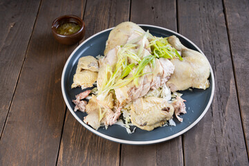 delicious steamed chicken with freshly chopped scallions on top