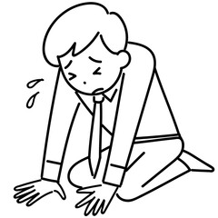 ガックリと床に膝をつく若いビジネスマン