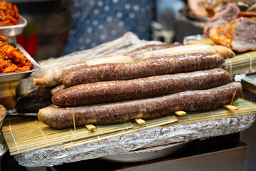 pork blood sausage, it consist of vermicelli mixed with pork blood and spices and wrapped in rice...