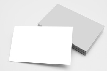 Image of business card stack template for brand identity separated with clipping path. Blank white business cards on gray paper background. Mockup for branding identity.