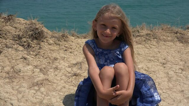 Child Playing on Beach, Kid Portrait Smiling on Seashore, Blonde Girl Playing in Sand by Sea Waves, Children in Summer Vacation