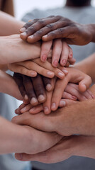 close up. young people making a tower of hands.