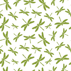 Seamless pattern with green dragonflies