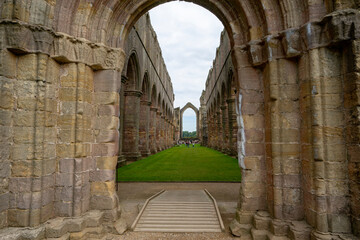 Symmetry of ruined Fountains Abbey Cistercian monastry. New Yorkshire, England, Great Britain, United Kingdom