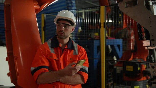 Engineers are using phones during working hours, Lazy people stop working and secretly play on their phones in industrial factories.