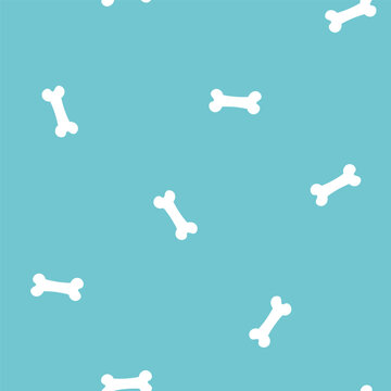 Blue seamless pattern with white bones