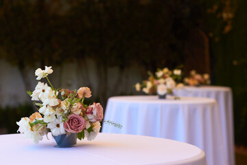 decorative floral arrangement on table in event room