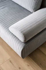 Fototapeta na wymiar new modern sofa with quality fabric cover in store