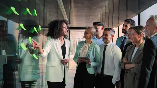 Group of business people start up team work brainstorming using post it in the office on a happy collaboration meeting. Businesswoman explaining the new marketing strategy or plan to her Generative AI