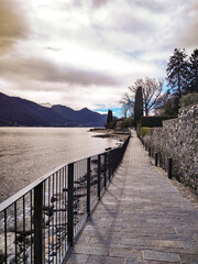 Walkway on Lake Como at sunset