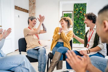 Support Group with Therapists and Woman in Focus solving problem