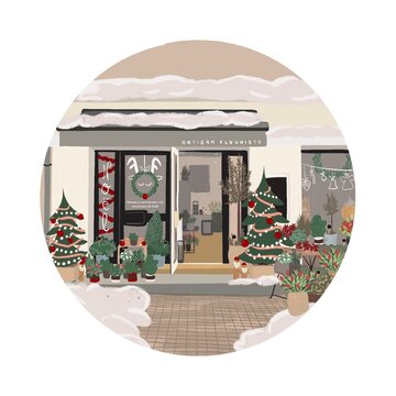 Vitrine d&rsquo;un artisan fleuriste d&eacute;cor&eacute; pour les f&ecirc;tes de fin d&rsquo;ann&eacute;e aux couleurs traditionnelles de no&euml;l 