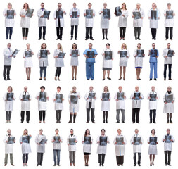Obraz premium group of doctors holding x-ray isolated on white