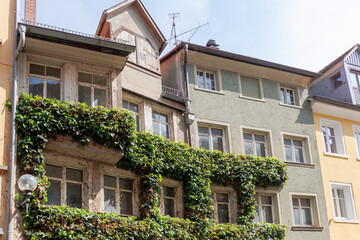 Houses and streets with historic residential facades in the Bavarian port city of Lindau on Lake Constance