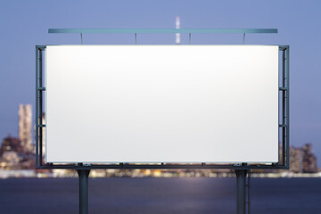 Blank white billboard on cityscape background at evening, front view. Mock up, advertising concept