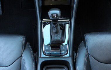 DSG automatic transmission. DSG Direct-shift gearbox. Gear lever close up. Modern Automatic Transmission in Car. Luxury car interior with leather car interior.
