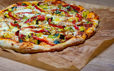 Homemade Pizza with zucchini and paprika.