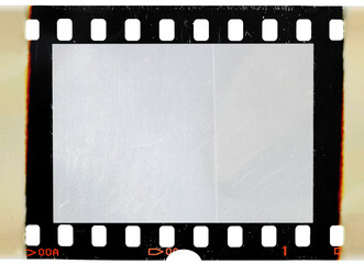 empty or overexposed 35mm film strip with burned edges, isolated film snip, dark film border.