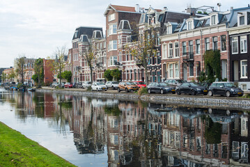 Houses in Amsterdam in the reflection of the canal