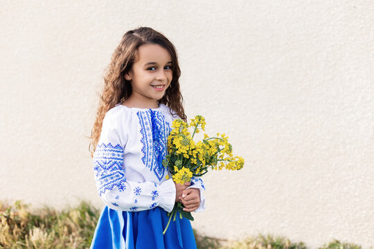 A little girl in Ukrainian national dress. Ukraine. Stop wor
