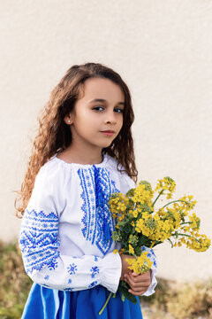 A little girl in Ukrainian national dress. Ukraine. Stop wor