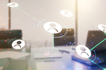 Double exposure of social network icons concept and modern desk with computer on background. Networking concept