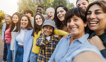 Group of multigenerational people taking selfie with phone camera - Multiracial friends of...