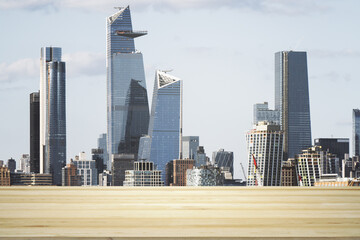 Blank table top made of wooden planks with beautiful New York cityscape at daytime on background, mockup