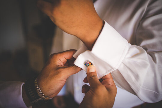 Close up creative image of a Groom's Wedding Attire at a real wedding