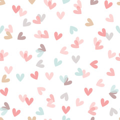Repeating hearts drawn by hand. Cute seamless patterns. An endless romantic imprint. Vector illustration.