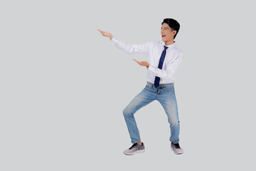 Fototapeta na wymiar Portrait young asian business man presenting isolated on white background, advertising and marketing, executive and manager, businessman confident showing success, expression and emotion.