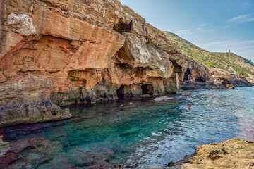 Cova Tallada in Jávea. Sea cave in the Montgó natural park. In this place you can snorkel. In Jávea, Alicante, Valencian community, Spain.